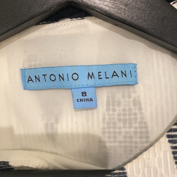 Gorgeous A-line pleated white and black knee length dress with coral hem accent - Picture 7 of 7